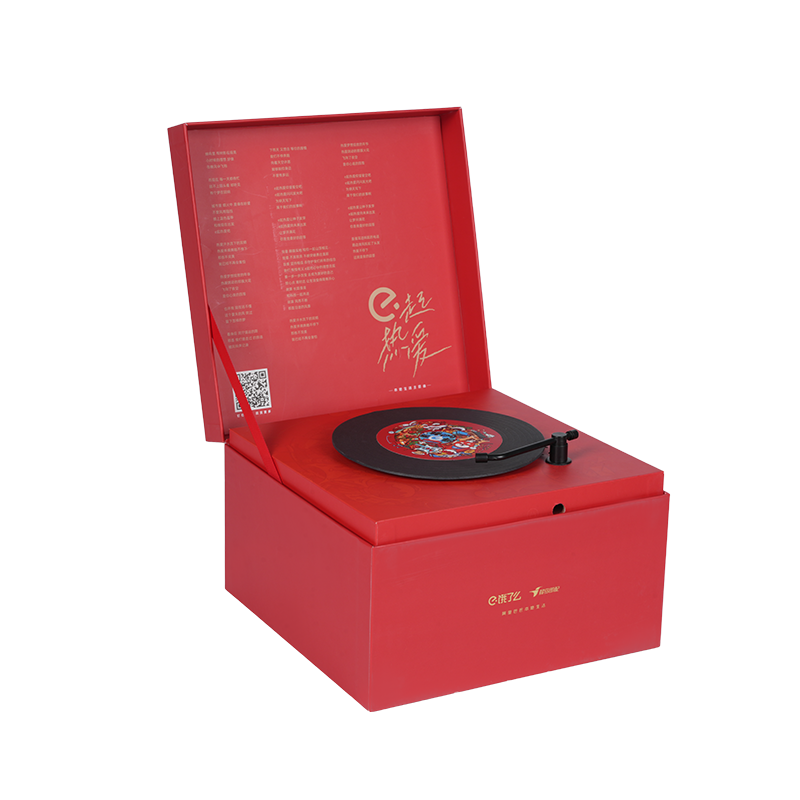 ホリデーをテーマにしたハードブック型の回転オルゴール